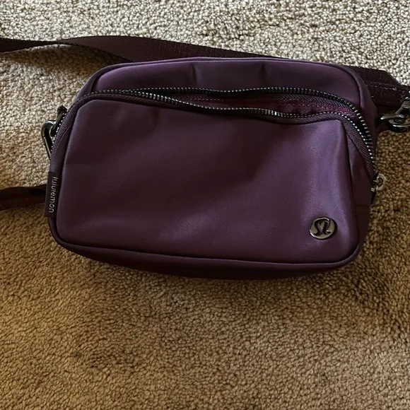 Lululemon Athletica Purple Crossbody Bag Sleek Design - Picture 1 of 3